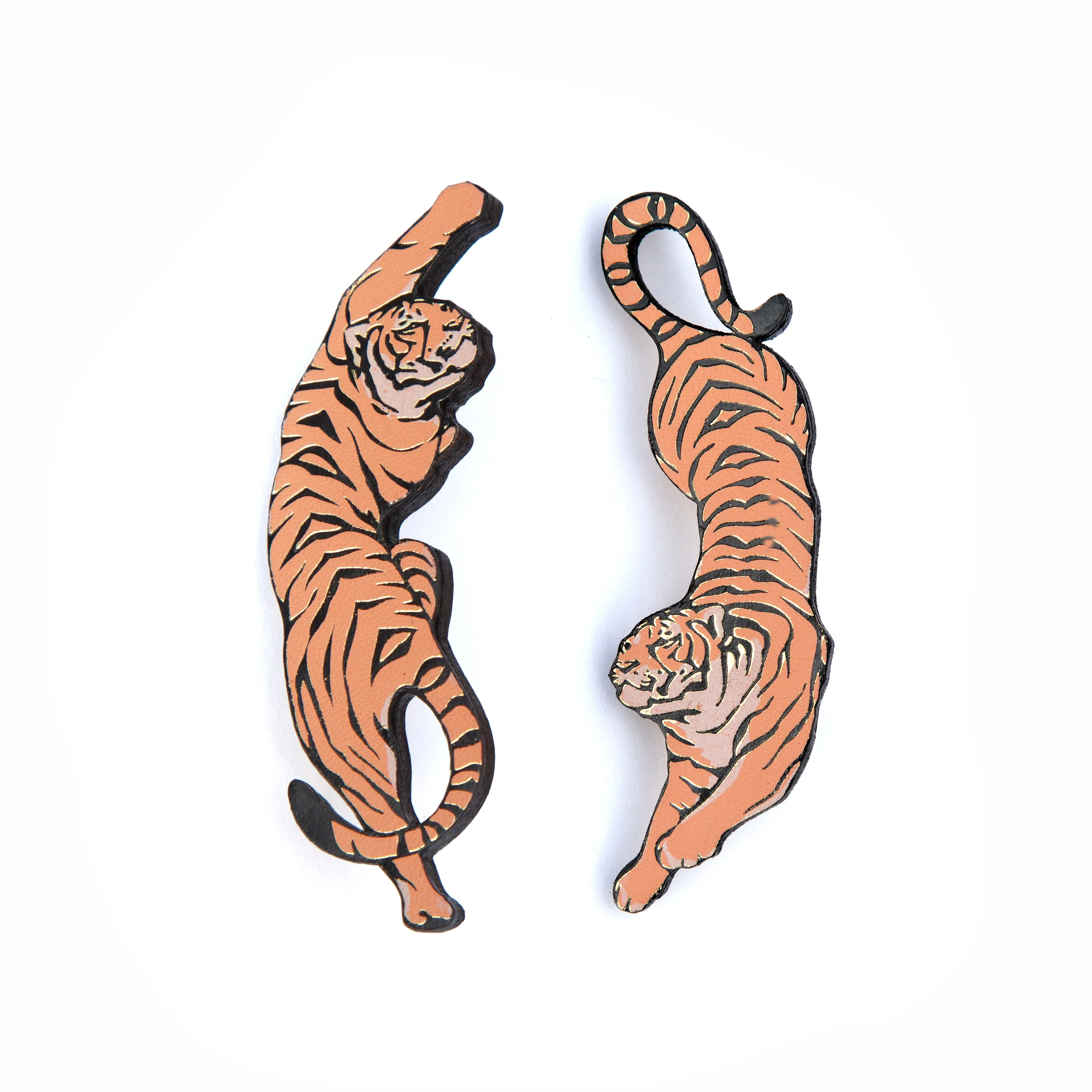 LEAPING TIGER . brooches